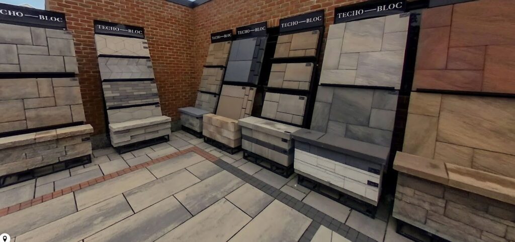 Masonry supply showroom in Deer Park featuring paver displays and stone samples